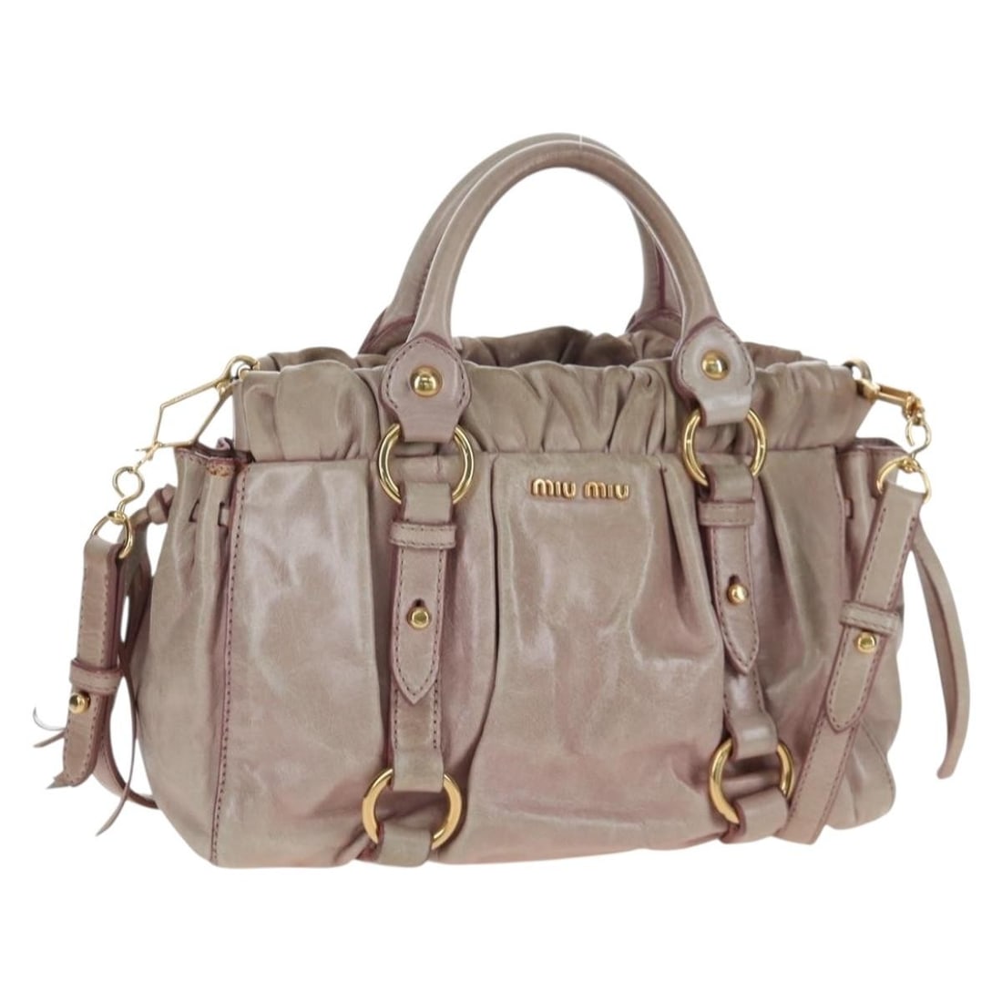 Miu Miu Pink Leather 2 Way Handbag with Shoulder Strap: Miu Miu Pink Leather 2 Way Handbag with Shoulder Strap Miu Miu 2-way handbag in pink leather with gold-tone accents. This women's bag includes a shoulder strap and can be carried by the handles or wor