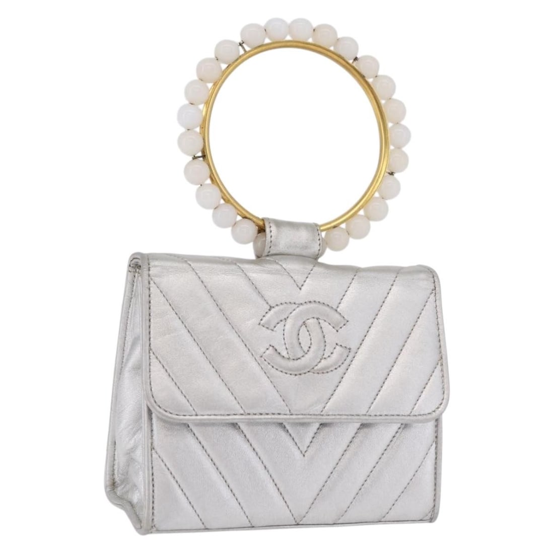 CHANEL V Stitch Lamb Skin Hand Bag Silver Gold CC Repainted: CHANEL V Stitch Lamb Skin Hand Bag Silver Gold CC Repainted Compact CHANEL V Stitch handbag crafted in lamb skin with a silver and gold colorway. This women's bag was made in Italy and has been repain