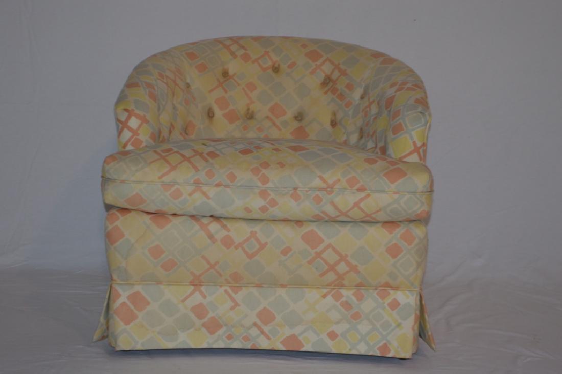 Modern Club Chair: A modern styled club chair, with a geometric fabric and one cushion. Property of Walter Wagner