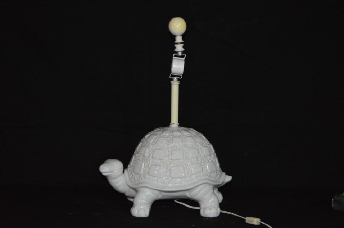 White Porcelain Turtle Lamp: A white porcelain turtle lamp. Property of Walter Wagner