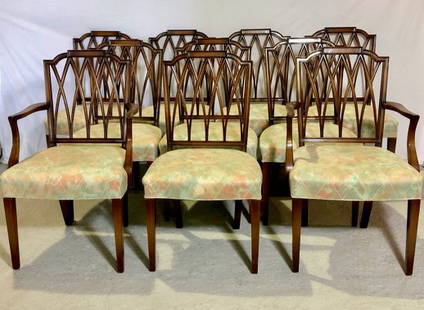 Ten George III Style Mahogany Dining Chairs by Bittners: A set of ten George III style mahogany dining chairs made by Bittner's of Louisville, KY. Two armchairs and eight dining chairs with square backs, upholstered seats and tapering legs. Unmarked, but pu