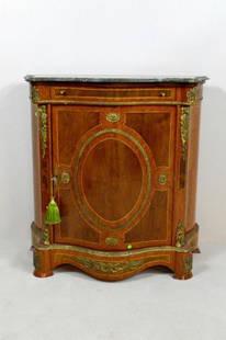 Louis XV Style Marble Top Side Cabinet: A vintage fruitwood and kingwood inlay serpentine side cabinet with conforming green marble top over a single drawer, a cabinet and ormolu mounts.