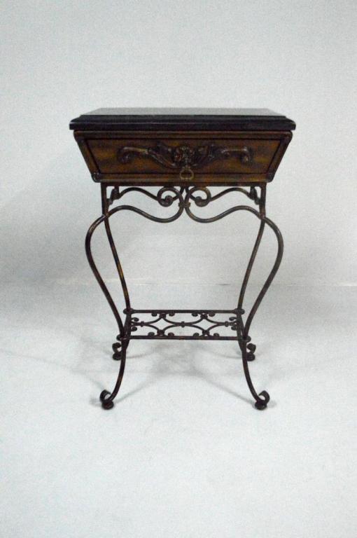 French Box on Stand: With a moulded rectangular black marble top over a metal casket form box with one drawer, the whole raised on a metal cabriole leg stand supported by a shelf stretcher.