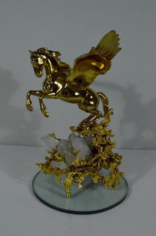 Claude Victor Boeltz (French, B. 1937), Sculpture of: Edition 5/100 Of Pegasus leaping, wings outstretched from a outcropping of quartz and an exploded, liquid like form, the whole, except the quartz crystals, signed and editioned on work.