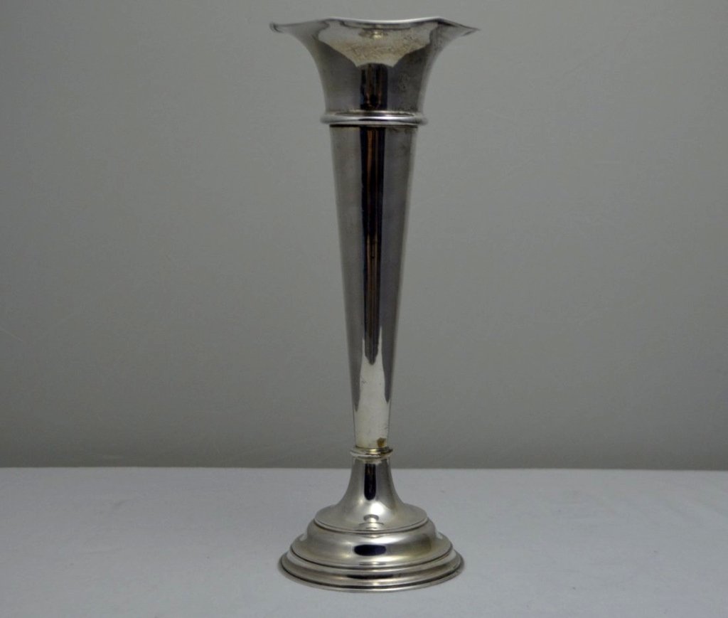 Silver Plate Trumpet Vase: Marked "Silver on copper" on base, with a flared lip and tapering body, with a circular base.