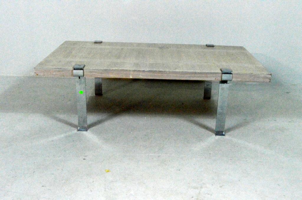 Modern Coffee Table: With a washed wood top, raised on 4 chrome legs. Atelier Paris is the maker.