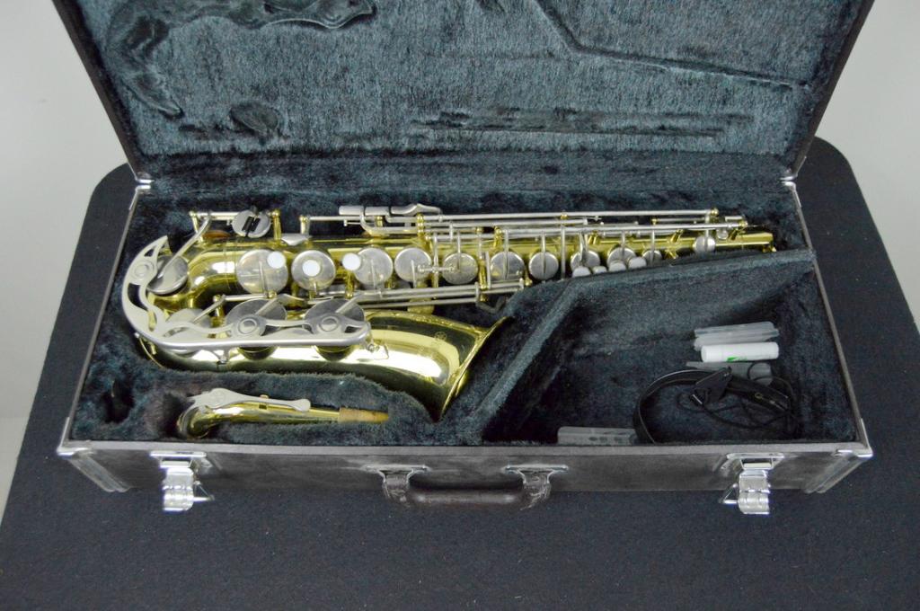 Yamaha Alto Saxophone - YAS 23 Model: In original case, with neck strap.