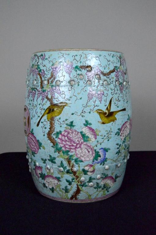 Chinese Garden Seat: With a light blue ground and painted with grape vines, birds and blooms.