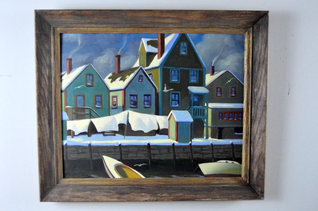 Harold Dean Collins (Kentucky, 1908-1987), Untitled: Oil on board, of a row of houses as viewed from the water looking over a snow covered quay. Image: 15 x 19 in. Frame: 19.5 x 23.5 in. Signed lower left.