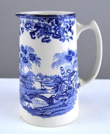 Royal Staffordshire Pitcher: Tonquin pattern by Clarice Cliff , marked on base. NOTE: Small Chip on base.