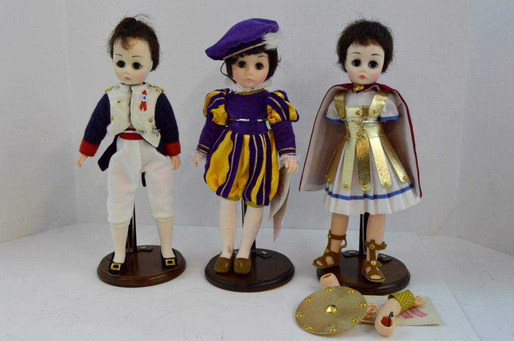 Three Madame Alexander Male Characters: One Prince Charming , One Anthony , One Napoleon Each are 12 in NOTE: In good condition except Anthony lost his arm in battle and arm is unattached but with the doll.