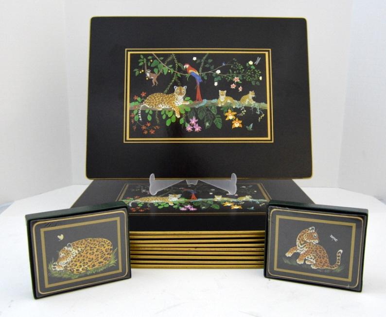 Ten Lynn Chase "Jaguar Jungle" Place Mats: Together with two unopened packs of coasters. Place mats are 15.5 x 11.5 in NOTE: Some scuffs consistent with use