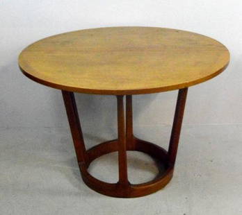 Mid Century Modern Butternut Breakfast Table: With a circular top over eight rounded square legs ending in a circular foot. 29.5 x 44 x 44 in.