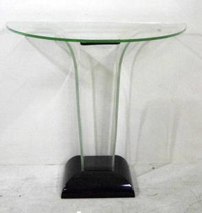 Contemporary Glass Pier Table: With demilune top over 3 arched glass staves. With a black lacquered base. NOTE: 3 chips in back of demilune and losses to lacquer on base. 30.5 x 32 x 16 in.