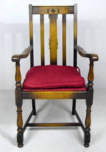 Eastlake Oak Armchair, 19th C.: With a Carved crestrail over three splats the shaped arms ending in turned stumps flanking in a drop in seat the whole raised on turned legs supported by an H stretcher. 40 x 22 x 20 in.