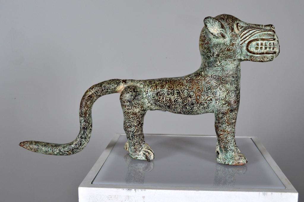 Benin Bronze of Spotted Leopard: African, Benin, Bronze; Of a standing leopard, with teeth bared and tail down. With good patination. NOTE: Repair to rear leg. 13.5 x 22 x 14 in. Condition: Wear consistent with age and use Property o