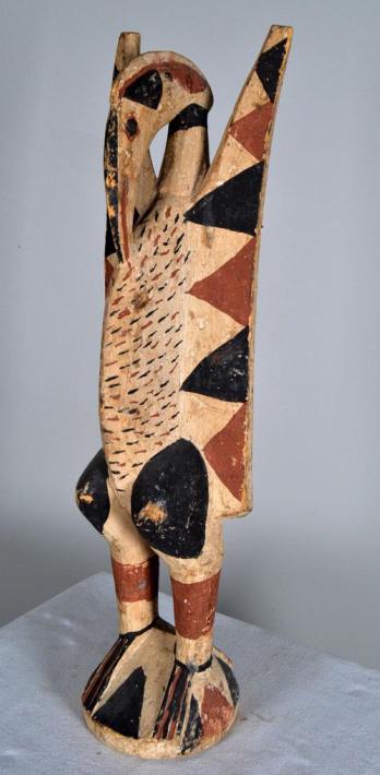 Dogon Bird Figure: African, Mali, 20th Century, of wood, with polychrome painting. 28 x 7 x 6 in. Condition: Wear consistent with age and use Property of Anthony French. Sr.