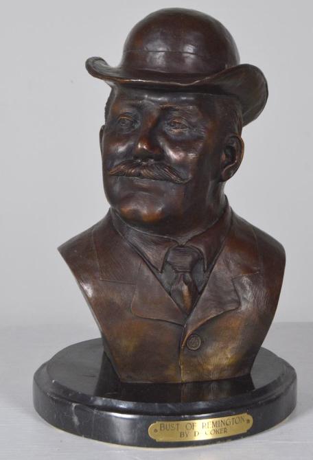 Darrell Coker (American, 20th Century): Bust of Frederic Remington Inscribed in cast on verso "Frederick Remington 1891 Copyright Darrell Coker Henry Bonnard Bronze Co Founders NY 1895" 13 in. tall on 9 in. base. Condition: No apparent flaw