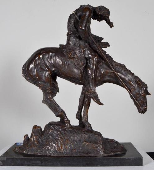 After James Fraser (American, 1876-1953): End of the Trail Bronze on marble base Signed in cast 22.5 x 19 x 8 in. Condition: Spear broken off at shoulder, chips to base, loose on base Property of Anthony French. Sr.