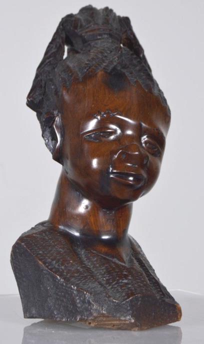 David Mudede (Zimbabwe, 20th Century): Ironwood bust of a young woman 12 x 5.5 x 4 in. Condition: No apparent flaws Property of Anthony French. Sr.