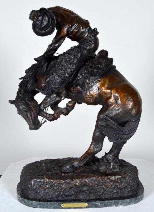 After Frederic Remington (American, 1861-1909): Rattlesnake Bronze on marble base Signed in cast, inscribed "Dedicated to Theodore Roosevelt, 1905" 22.5 x 15 x 9 in. Condition: No apparent flaws Property of Anthony French. Sr.