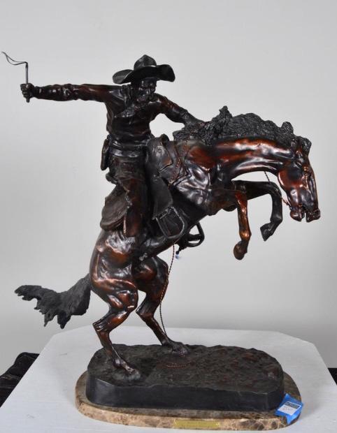 After Frederic Remington (American, 1861-1909): Bronco Buster Bronze on marble base Signed in cast 22 x 15 x 8 in. Condition: No apparent flaws Property of Anthony French. Sr.