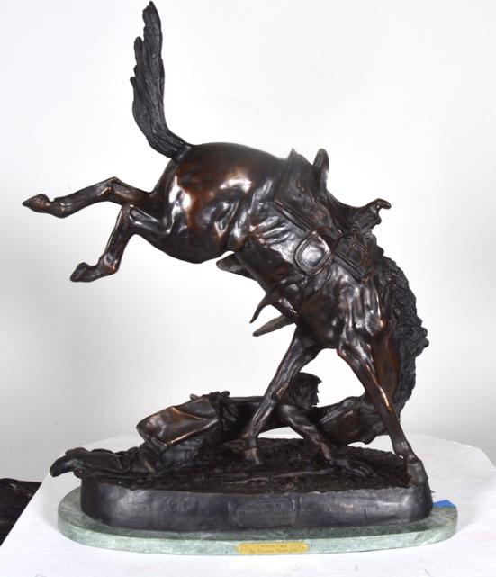 After Frederic Remington (American, 1861-1909): Wicked Pony Bronze on marble base Signed in cast 22.5 x 17.5 x 10 in. Condition: No apparent flaws Property of Anthony French. Sr.