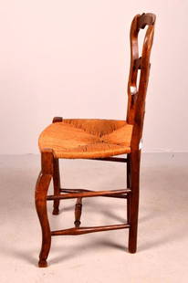 Cane Seat Chair: With a shaped crest rail and splats flanked by two shaped side rails, the caned seat over cabriole legs supported by an H-stretcher. 36 x 17 x 15 in. NOTE: No apparent flaws