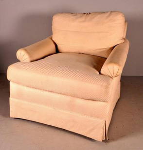 Modern Upholstered Club Chair: Labeled Michael Thomas. The whole upholstered in white fabric, with slight staining throughout. 30 x 34 x 35 in.