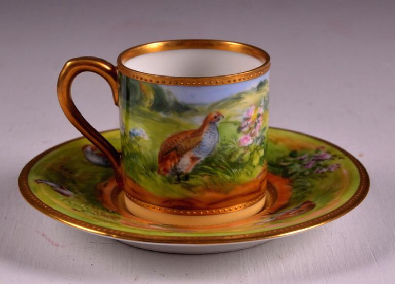 Fraureuth Demi Tasse Cup and Saucer: The cup has gold plate on rim and handle with pheasants on spring field ground. Saucer has pheasants on green ground with cream base. cup is 2 in. x 3 in. saucer 1 in. x 4 D. Marked Excellent conditio
