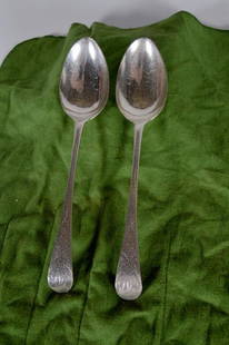 Two Hester Bateman Sterling Silver Serving Spoons: Two identical Hester Bateman monogrammed serving spoons 1750 approx 199 grams 8.5 in. Condition consistent with wear and use. Marked on back of spoons.