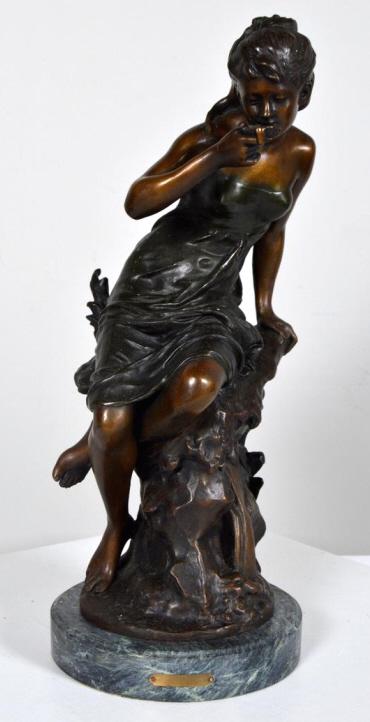 After Auguste Moreau (French, 1855-1919): Golden Girl Bronze on marble pedestal Inscribed in cast on work 21 x 9 x 9 in. NOTE: Condition consistent with age and use.