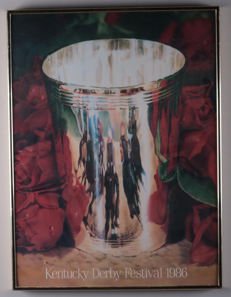 1986 Kentucky Derby Festival Poster: Artist: Cynthia Torp (American, 20th Century)Poster,1986; Silver mint julep cup with reflection of horses with red roses in the background.Image: 23.5 x 17.5 in.; Frame: 24 x 18 in.Glazed and matted i