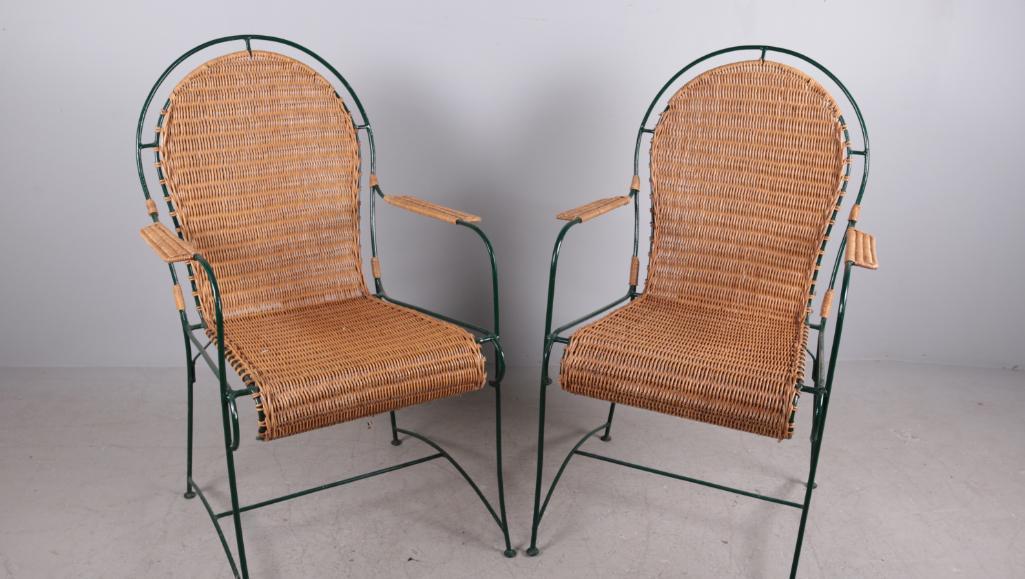 Pair of Wicker and Iron Deck Chairs: Wicker back, seat and arms. Dimensions: 37 x 19.5 x 20.5 in. Condition: Good, but shows wear.