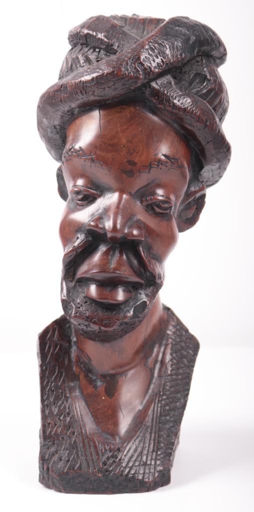 David Mudede (Zimbabwe, 20th Century): Untitled, Ironwood bust of a Swazi Man , 12 x 4 x 5 in. Image: x in.; Frame: x in. Condition: Wear consistent with age and use. Property of Anthony French Jr.