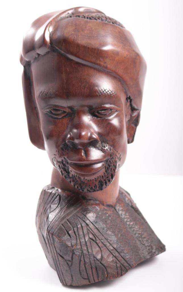 David Mudede (Zimbabwe, 20th Century): Untitled, Ironwood bust of a Swazi Man , 11 x 6 x 4 in. Image: x in.; Frame: x in. Condition: Wear consistent with age and use. Property of Anthony French Jr.
