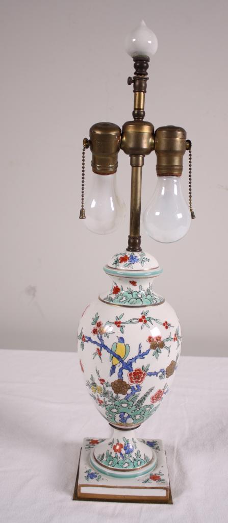 Porcelain Floral Lamp: Of urn form Dimensions: 23 x 6 x 6 in. NOTE: Wear consistent with age and use