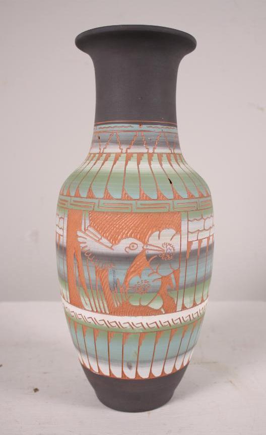 20th Century Navajo Jar: Signed Dennison Billy on base Dimensions: 14 x 6.5 x 6.5 in. NOTE: No apparent flaws
