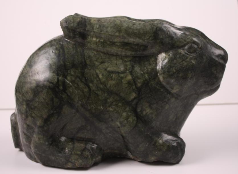 Large Green Stone Bunny: Of usual form Dimensions: H 9 x W 13 x D 7 inches NOTE: Wear consistent with age and use