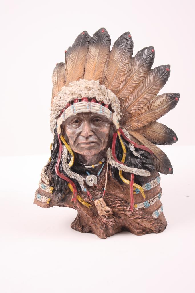 Sculpture of a Plains Chief: With an eagle headdress Dimensions: H 8 x W 6 x D 3 inches NOTE: Wear consistent with age and use