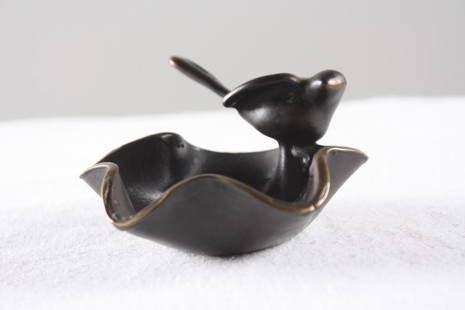 Shatsby Bronze Bud Dish: With a bird perched on the rim, marked "shatsby" underneath Dimensions: H 2 x W 3 x D 3.5 inches NOTE: No apparent flaws