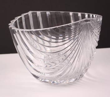 Fluted Crystal Bowl: Of roughly oyster shell form, with deeply incised fluting Dimensions: H 7 x W 9.5 x D 9.75 inches NOTE: No evidence of repairs, chips or cracks