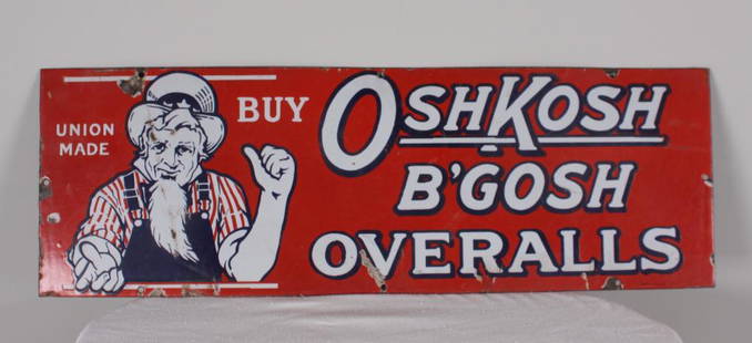 OshKosh B'Gosh Overalls Sign: Red, white and blue enamel sign featuring Uncle Sam in overalls, with &#34;Union Made&#34; and &#39;Buy OshKosh B&#39;Gosh Overalls&#34;. Smudged Burdick Enamel Sign Co. mark lower right. Dimensions: