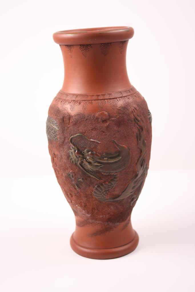 Chinese Pottery Vase, 20th C: Earthenware, of usual form with dragon motifDimensions: H 12 x W 5.5 x D 5.5 inchesNOTE: Wear consistent with age and use