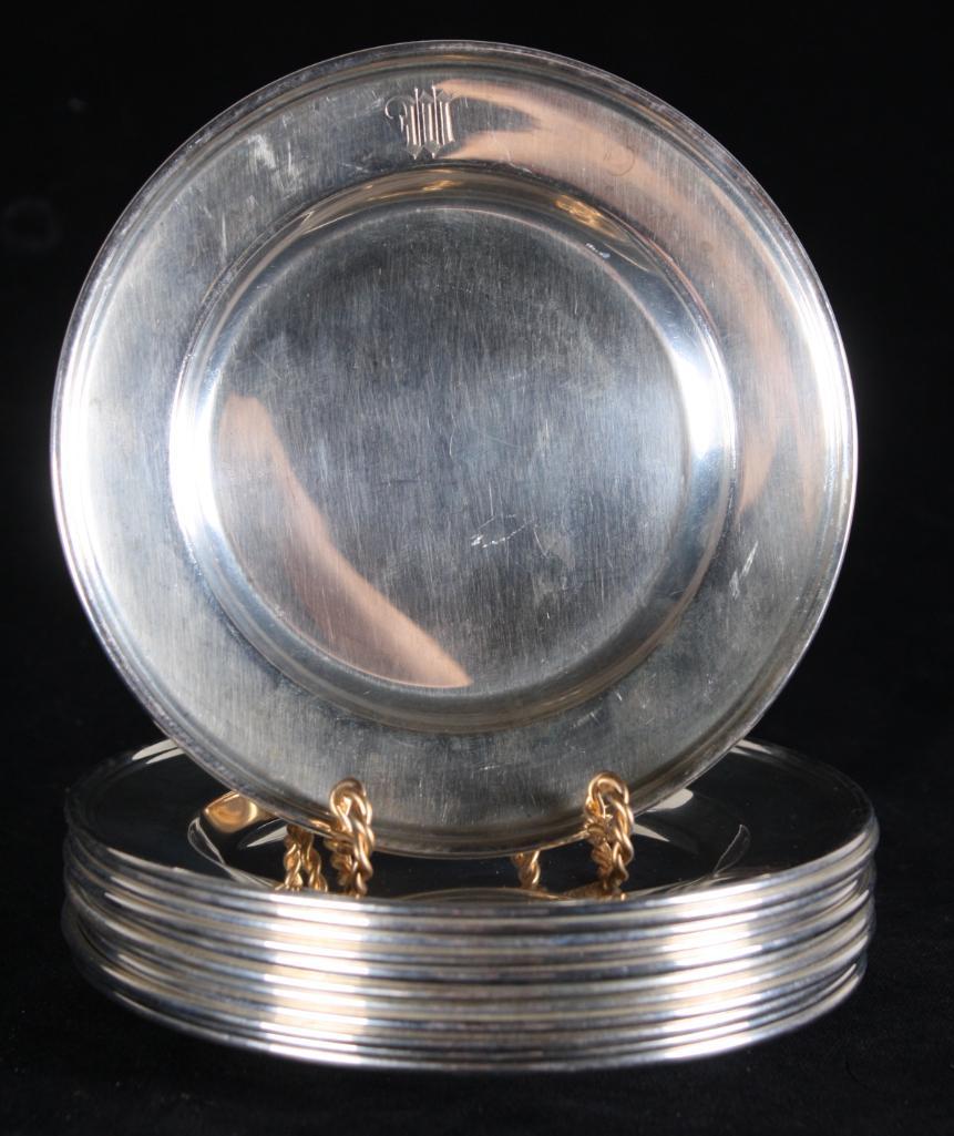 Twelve Hamilton Sterling Bread Plates: Monogrammed with a "W" marked on base, total weight 855g Dimensions: H 0.5 x W 6 x D 6 inches NOTE: No apparent flaws