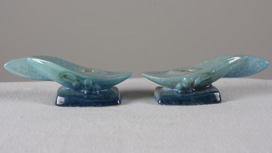 Roseville Pottery Windcraft Candle Holders: Blue ground, each marked 205-2 on base. Dimensions: H 2 x W 6 x D 3 inches NOTE: No evidence of cracks, chips or repairs