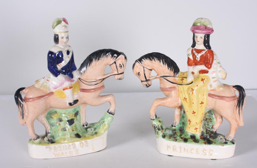 Two Staffordshire Figurines: One of the Prince of Wales, the other of the Princess Dimensions: H 9 x W 7 x D 2 inches NOTE: No evidence of cracks or chips Property from the Estate of Bill Ford, Paducah, KY