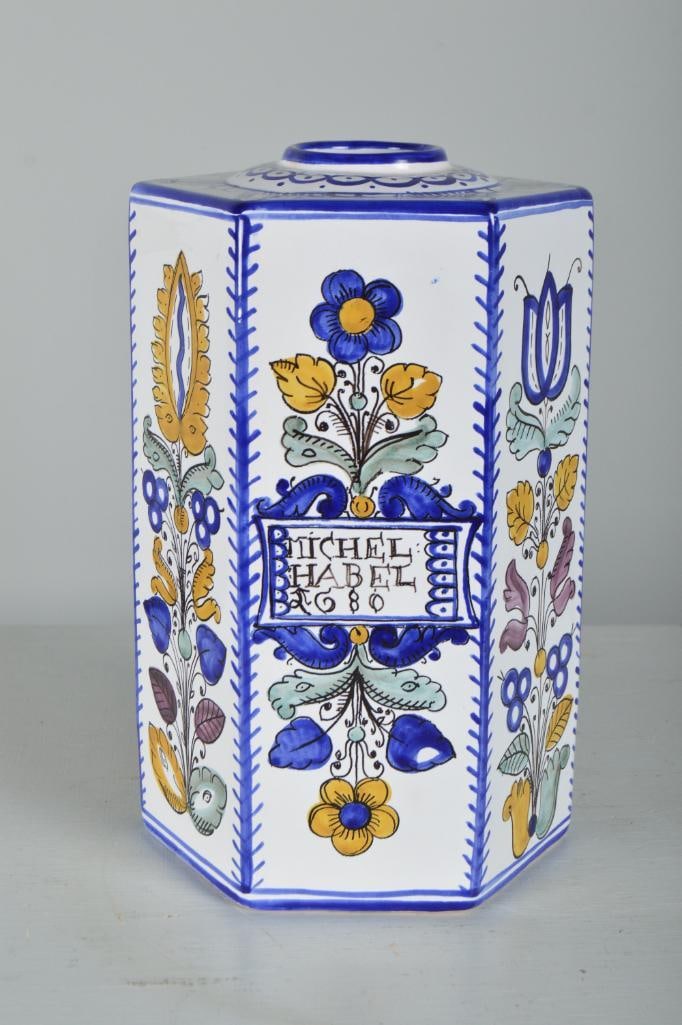 Michel Habel 1680 Ceramic Vase: Of modern manufacture. Five sided vase with Hungarian decorations, marked indistinctly on base. Dimensions: H 10 x W 6.5 x D 6.5 inches NOTE: No apparent chips or cracks