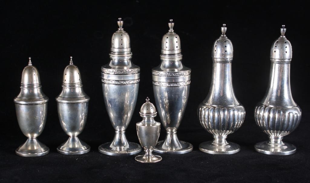 Seven American Sterling Castors: Two with weighted bases, each marked, total weighable silver 222g. Dimensions: H x W x D inches NOTE: No apparent flaws