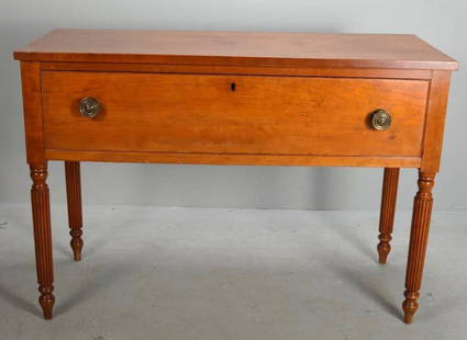 Federal Cherry Buffet, Possibly KY: With a rectangular top over a single beaded drawer, raised on turned and reeded legs. Circa 19th c.   Dimensions: H 29.5 x W 42.5 x D 18 inches  NOTE: Wear consistent with age and use